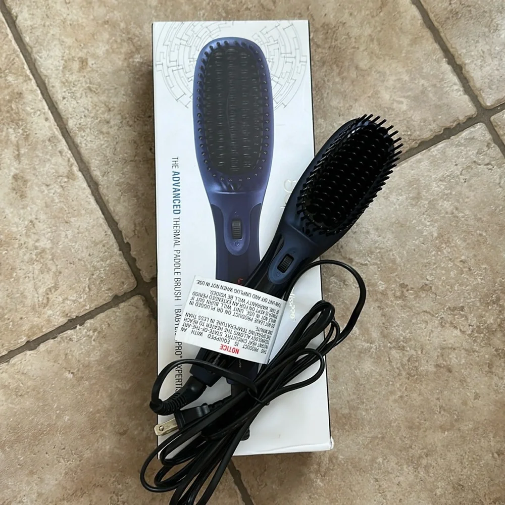 Never used Aquage (BabylissPRO) Blue Thermal Paddle Brush. In box.